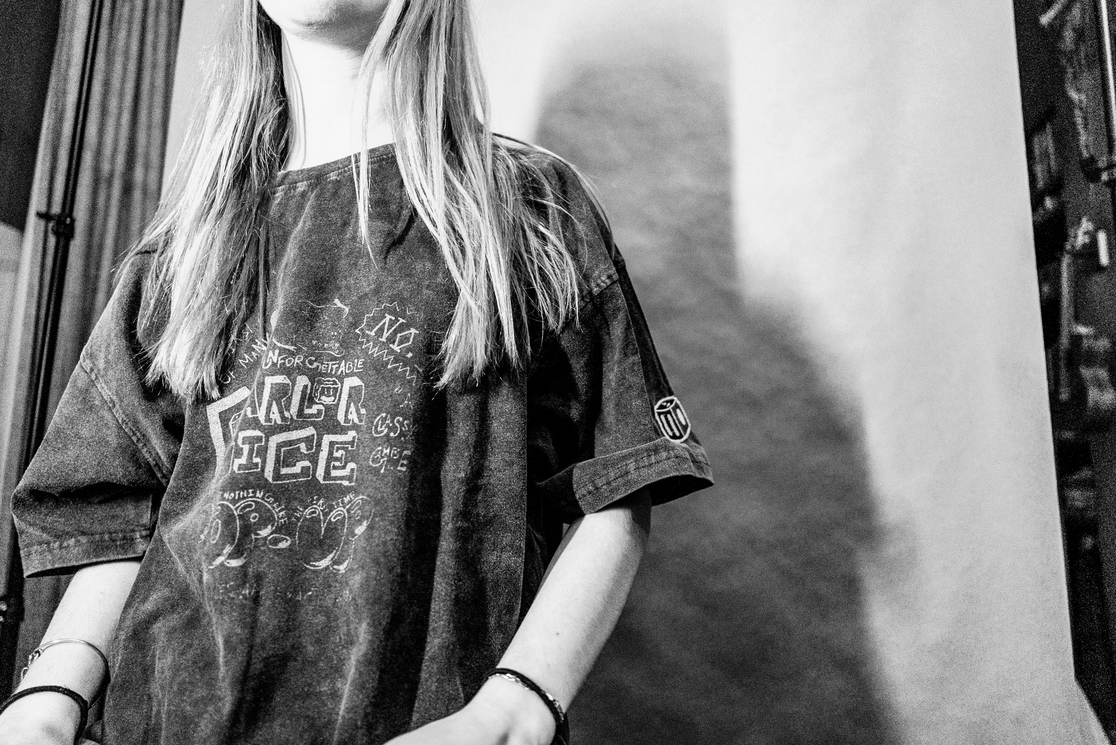 Model wearing the "Popup" Graphic Tee in Navy - Black and White Image